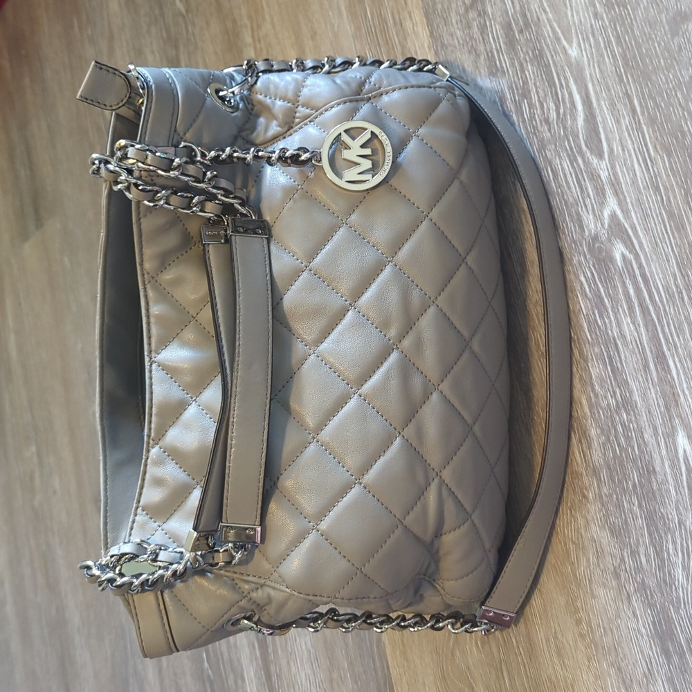 Michael Kors grey quilted leather shoulder bag.